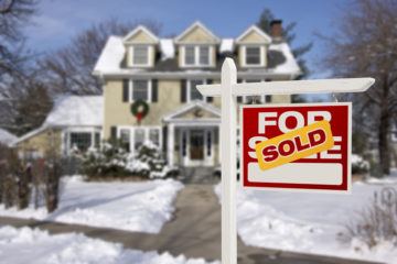 Sold Home For Sale Sign in Front of Colorado House