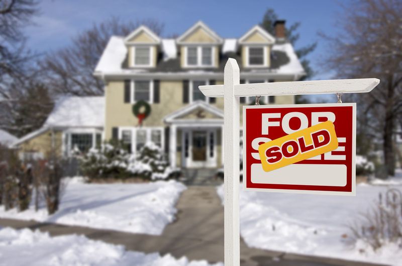 Sold Home For Sale Sign in Front of Colorado House