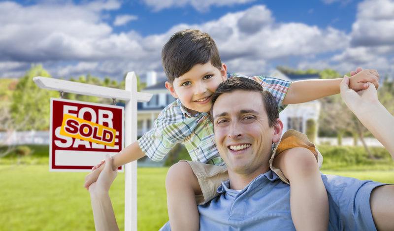 Mixed Race Father, Son Piggyback, Front of Delaware House, Sold Sign