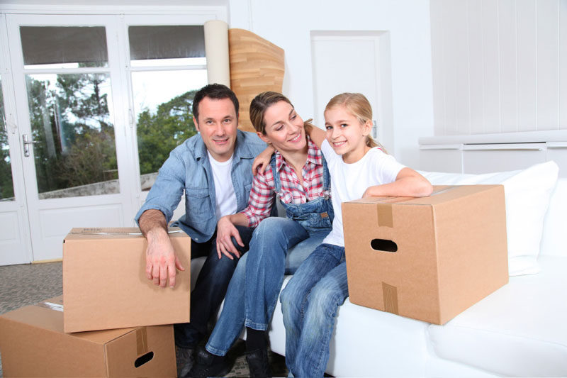 Atlanta couple and single child sitting in front porch in preparation of big move after selling their home.