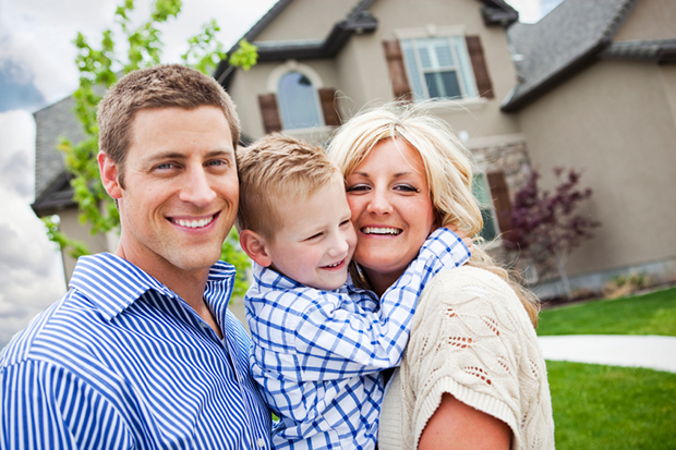 Young family outside their recently Santa Clara, CA house.